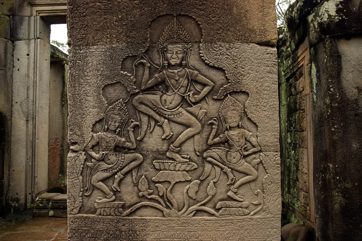 Dancing apsara carved on a stone pillar at the Bayon