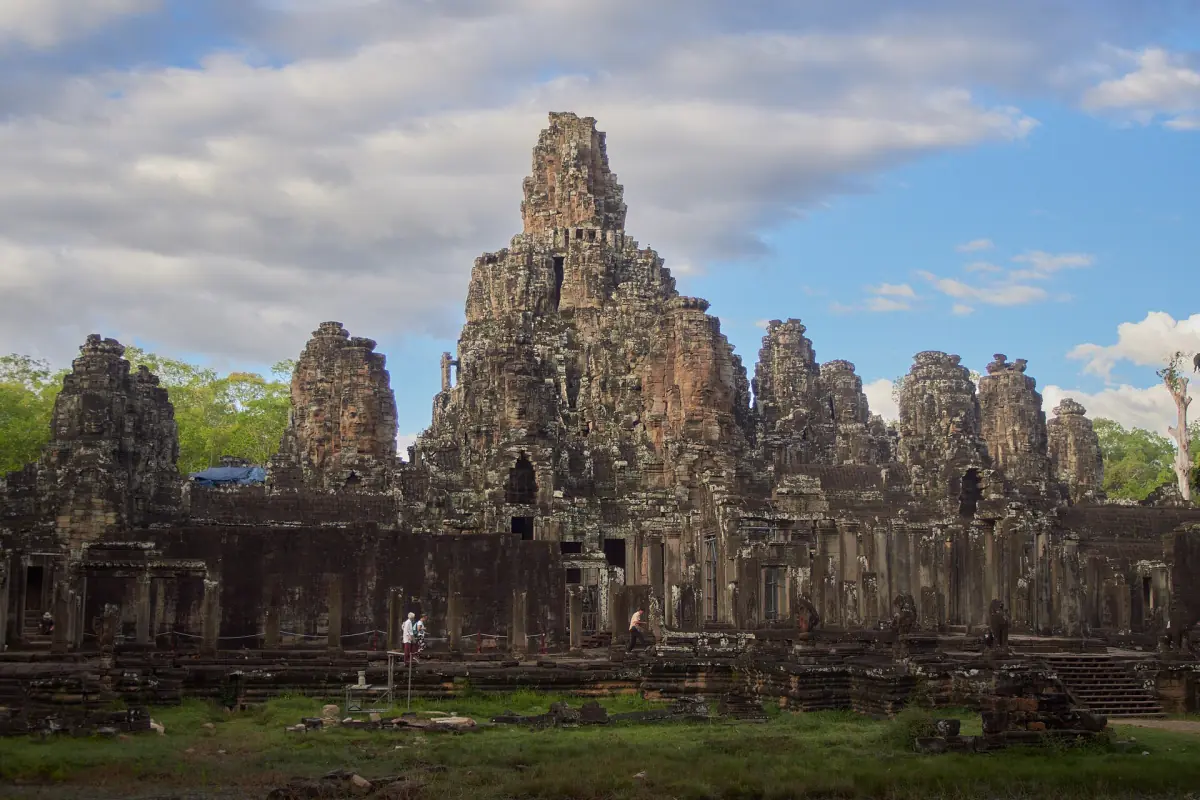 Wide view of the Bayon temple with its central tower and lower galleries