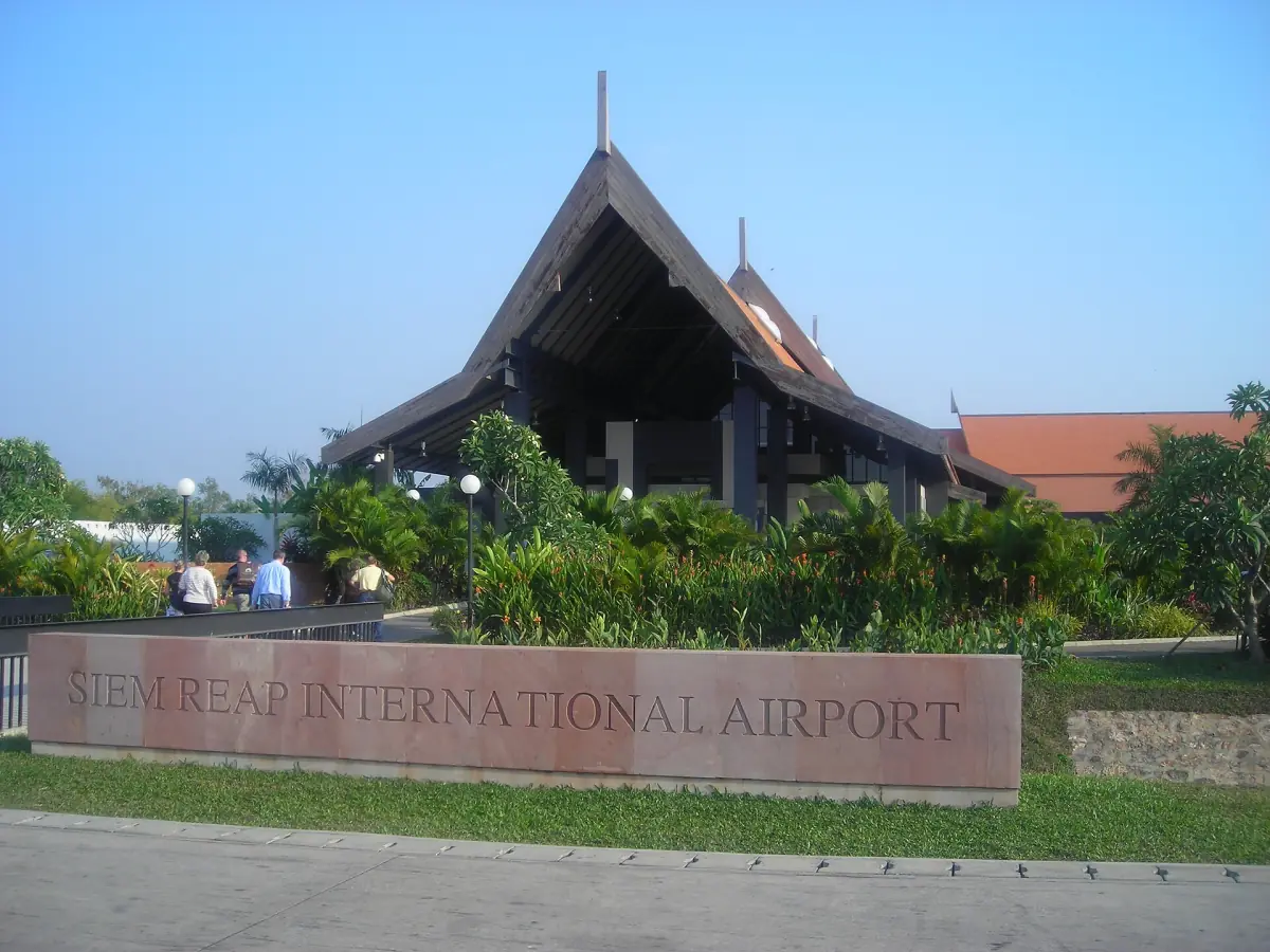 Siem Reap airport terminal with a pitched Khmer-style roof and entrance sign